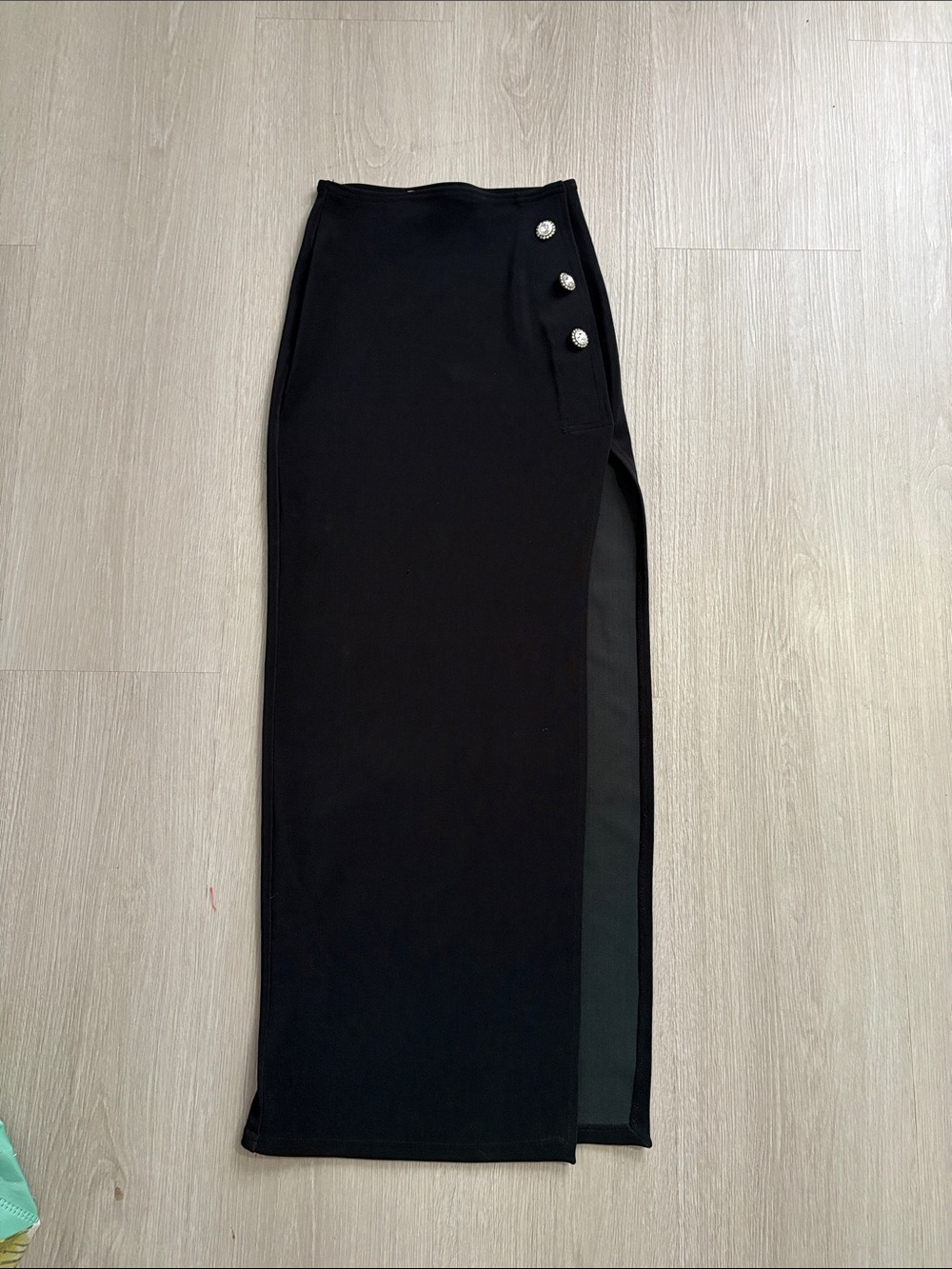 Black High-Slit Maxi Skirt with Decorative Buttons